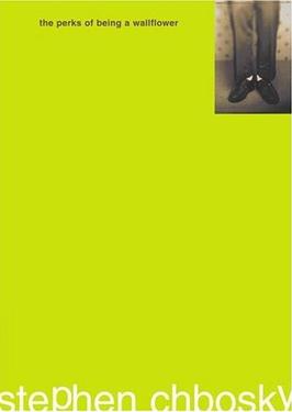 the perks of being a wallflower by stephen chbosky. lime green background with small sepia toned photo upper right corner of legs from knees to feet wearing pants and shoes standing with back to a wallpapered wall.